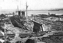 Mount Vernon in a drydock in Brest for repairs after being torpedoed by U-82, September 1918. USS Mount Vernon 1918 im Trockendock.jpg