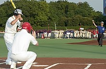 A Japanese mayor throws a pitch to a U.S. Navy captain. Japan and the U.S. share many cultural links, including a love for baseball imported from the US. US Navy 070817-N-8534H-001 Ryoichi Kabaya, the Mayor of Yokosuka City, throws the opening pitch to Capt. Daniel Weed, commander of Fleet Activities Yokosuka, hoping to get one past Japan Maritime Self Defense Force Rear Adm. Is.jpg