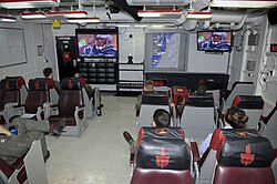 US Navy 120205-N-VA840-080 Sailors watch Super Bowl XLVI in one of the ready rooms.jpg