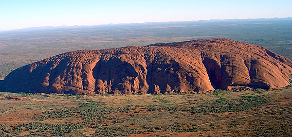 Uluru (Ayers Rock) in Australia is underlain by the Mutitjulu Arkose, a formation composed almost entirely of a single lithology (arkosic sandstone).