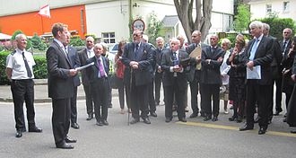 HM Solicitor-General presents argument before the Royal Court, voyeurs and officials regarding whether the Parish of Saint Helier could remove dead trees at risk of falling into the roadway (2012) Visite Royale Saint Helier 2012 7.jpg