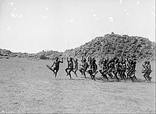 Walter Baldwin Spencer and Francis J Gillen - Arrernte welcoming dance, entrance of the strangers, Alice Springs, Central Australia, 9 May 1901 - Google Art Project.jpg