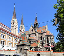 St. Canisius's Church with presbytery and monastery garden Wien - Canisiuskirche.JPG