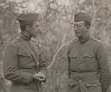 Major Charles W. Whittlesey (right) of the 77th Infantry Division talking to Major Kenny, commander of 307th Infantry, after the "Lost Battalion" was rescued during the Meuse-Argonne offensive. 111-SC-42756 - NARA - 55244713-cropped.jpg