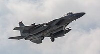 A US Air Force F-15C Eagle, tail number 83-0011, on final approach at Kadena Air Base in Okinawa, Japan. The aircraft is assigned to the 67th Fighter Squadron.