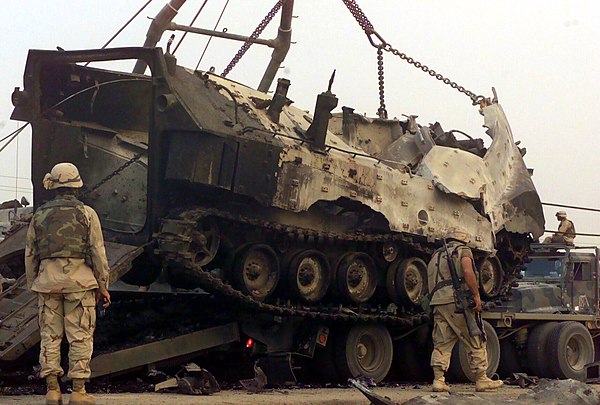 A USMC Assault Amphibious Vehicle destroyed at Nasiriyah, Iraq, in a maintenance area. 11 April 2003.