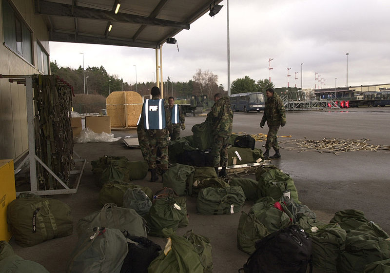 File:Airman 1st Class Jamal Avery of the 86th Maintenance Squadron, Airman 1st Class Richard Washburn of the 86th Transportation Squadron and Airman 1st Class James Jackson from the 86th Supply Squadron build a 020128-F-ZU221-010.jpg