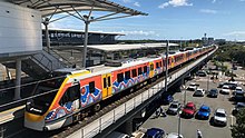 The Airport line travels direct from each terminal to Brisbane and the Gold Coast Airtrain NGR Indigenous.jpg