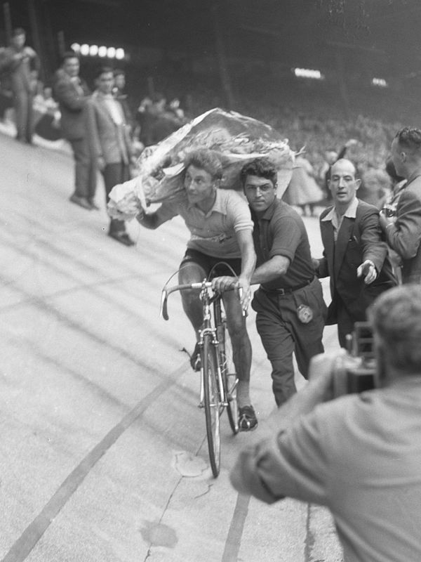 General classification winner Jacques Anquetil taking his victory lap at the end of the Tour in the Parc des Princes in Paris