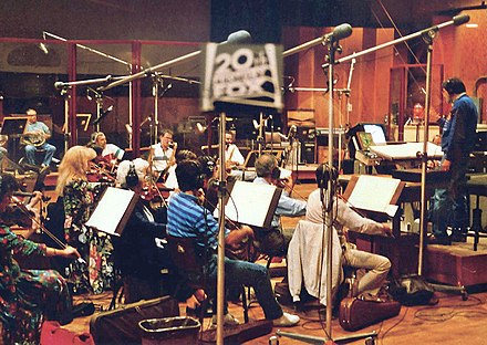 An orchestra recorded "live" in the studio