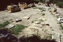 Remains of the eastern end of the colonnade of South Stoa I, looking westsouthwest Athens Agora South Stoa I east end from NE (1991).jpg