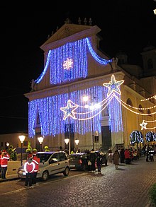 The facade of the basilica on St. Barnabas Square during Christmas 2008. Basilica San Barnaba Natale 2008.JPG
