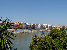 Betis Street (Triana) and Guadalquivir River Betis Sevilla.jpg