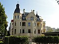 Villa with enclosure and garden