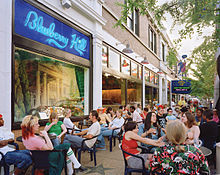 The Delmar Loop is a neighborhood close to Washington University, on the border of the city and St. Louis County. Blueberry Hill patio.jpg