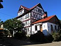 Right residential building of a three-sided courtyard at Brunnenstrasse 1