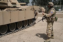 Captain Conway Bown, Australian Army Official War Artist, Iraq, 2006 Captain Bown sketching US Army M1A1 in Baghdad during his deployment as the Australian Army's Official Army War Artist, 2006.jpg