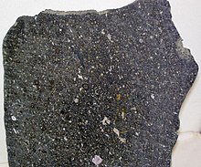 Carbonaceous chondrites such as the Allende Meteorite (above) likely delivered much of the Earth's water, as evidenced by their isotopic similarities to ocean water. Carbonaceous chondrite (Allende Meteorite) (4.560-4.568 Ga) 6 (16763228023).jpg