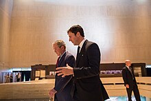 Former President George W. Bush arrives at the LBJ Presidential Library with Updegrove for the Civil Rights Summit, April 10, 2014 DIG13639-071 (13771761843).jpg