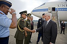 Gates is greeted by Indonesian military members after arriving in Jakarta,Indonesia on July 22,2010. Defense.gov News Photo 100722-D-7203C-001 - Secretary of Defense Robert M. Gates is greeted by Indonesian military members after his arrival at the Halim Perdanakusuma International Airport.jpg