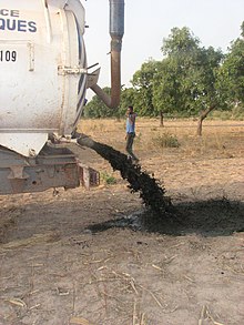 Lack of fecal sludge management: Discharge of fecal sludge into the environment in Burkina Faso Discharge of faecal sludge into the environment- Deversement Wend Lamita 20071128 07 (5014300112).jpg