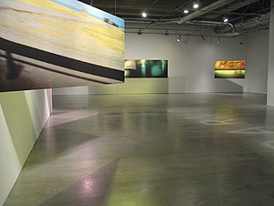 Exhibition view of Greiman's solo exhibition Drive-by Shooting: April Greiman Digital Photography at the Pasadena Museum of California Art, 2006. Drive-byshooting.jpg