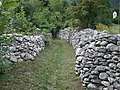 Dry stone wall with old Roman path