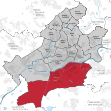 Mapa que ubica el municipio (en rojo) dentro del resto de la ciudad (en gris)