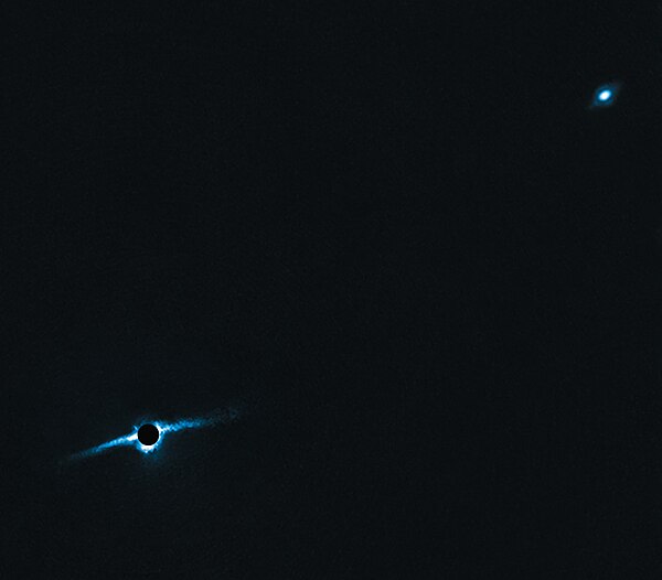 Edge-on disc of gas and dust present around the binary star system HD 106906