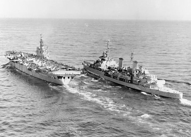 Ocean cruising off the coast of Korea alongside Belfast in 1952