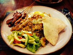 Nasi goreng-chicken satay combo, quintessential Indonesian dish among foreigners
