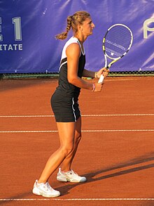 Romanian Irina-Camelia Begu lifted both the singles and the doubles trophies Irina-Camelia Begu warming-up at the 2011 BCR Open Romania Ladies.jpg