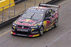 Jamie Whincup in Red Bull Racing Australia car 1, departing pitlane during the V8 Supercars Test Day.jpg