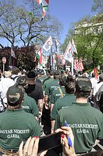 Members of the New Hungarian Guard stand at a Jobbik rally against a gathering of the World Jewish Congress in Budapest, 4 May 2013 Jobbik-NewHungarianGuard-May2013.jpg