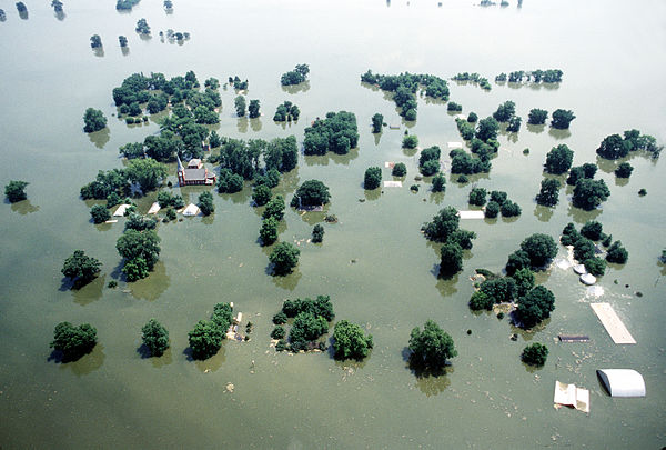 1993 flooding of Kaskaskia, looking south downriver; church spire is in center left