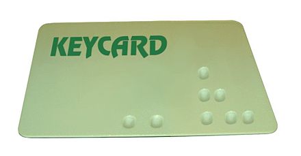 A mechanical keycard, with "bumps" that operate pins inside of the lock (similar to a pin tumbler lock)