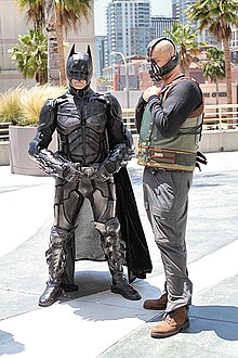 Cosplayers dressed as Christian Bale's Batman and Tom Hardy's Bane as portrayed in The Dark Knight Rises LBCE 2014 - Batman and Bane (14180086097).jpg