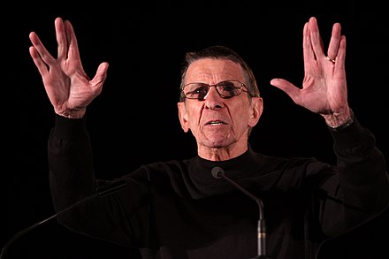 Nimoy demonstrating the Blessing gesture he said was the inspiration for the Vulcan salute
