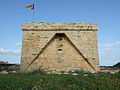 Quadermauerwerk eines alten Wachturms Castell de sa Punta de n’Amer