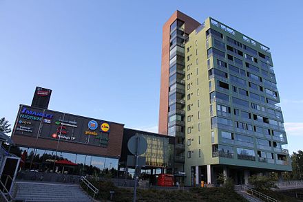 The Martinlaakso shopping centre, built at the site where the previous shopping centre was dismantled. The new shopping centre was opened in autumn 2011. The Martintalo building next to the shopping centre is the tallest tower block in Finland with a height of 56 metres.