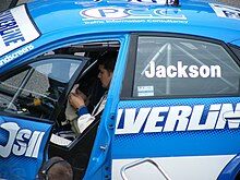 Jackson in his RML Chevrolet at Rockingham Motor Speedway in 2009 preparing for the race start Mat Jackson BTCC 2009.JPG