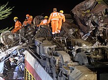 Members of the National Disaster Response Force on the site, June 3 Members of National Disaster Response Forces at the site of rail accident near Bahanaga Bazar Railway station.jpg