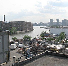 Mouth of the Creek, seen from Pulaski Bridge. Manhattan Avenue Bridge formerly connected Manhattan Avenue on the left bank to Vernon Boulevard