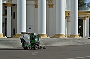 A Nilfisk Park Ranger 2150 street sweeper goes past the portico of Pavilion No. 71 Nuclear Power. (2020).