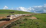 E 1350 (More powerful version of the E 1300) with a loaded phosphate train on its way to Casablanca, near Tamdrost