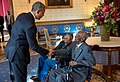 Obama greets Richard Overton with Earlene Love-Karo.jpg