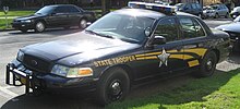 A Ford Crown Victoria Police Interceptor of the Oregon State Police parked at the Oregon State Capitol in April 2007. Oregon State Police car.JPG