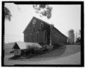 Perspective view from the northwest. An equipment shed is in the foreground, the silos are in the rear. - Blough Farm, 845 Spiegle Road, Hollsopple, Somerset County, PA HABS PA-6745-2.tif