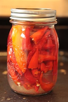 A jar of pickled peppers Pickled peppers.jpg