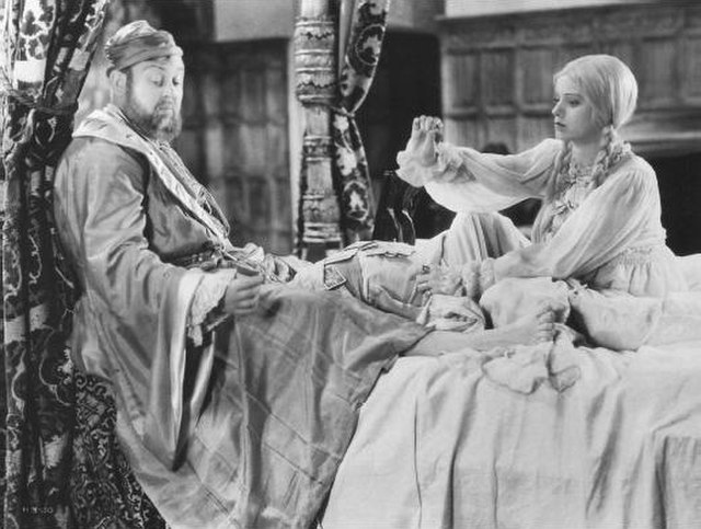 King Henry VIII (Charles Laughton) and Anne of Cleves (Elsa Lanchester) on their wedding night in The Private Life of Henry VIII